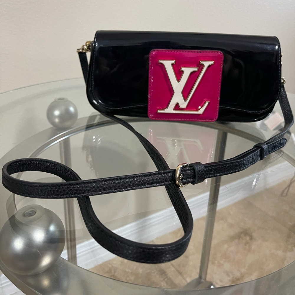 Louis Vuitton Sobe clutch